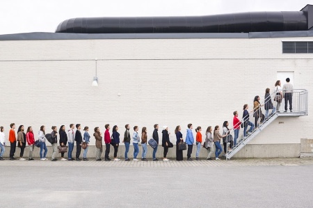 queue_of_people_outside_warehous_450.jpg